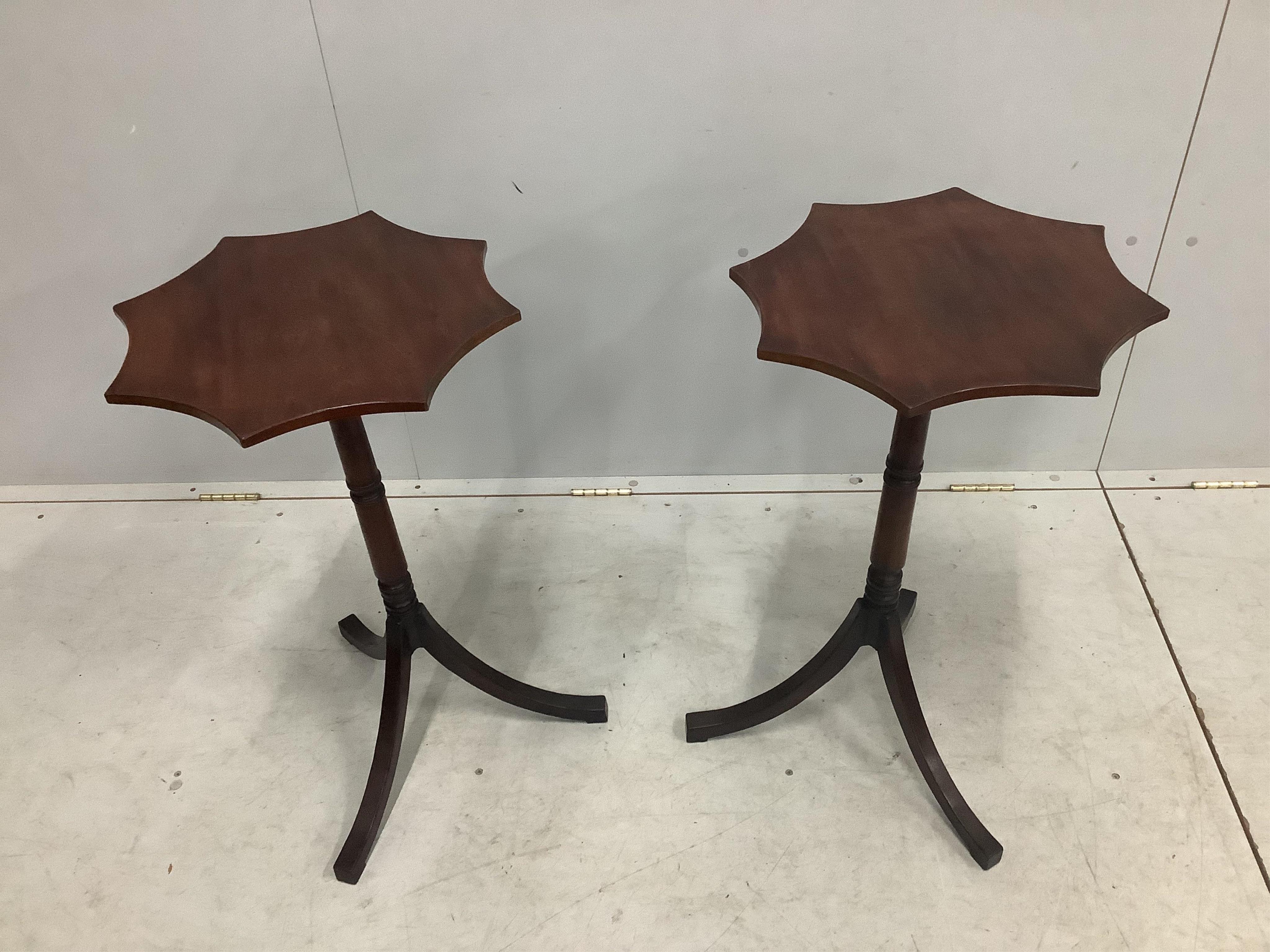 A pair of Regency style mahogany tripod wine tables, width 43cm, height 74cm. Condition - fair to good